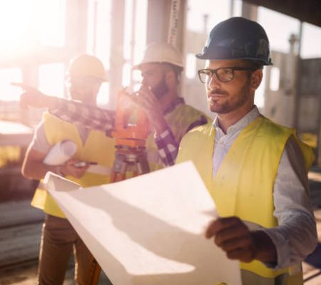 Picture of male construction engineer working on building site